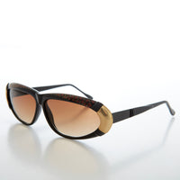 Women's vintage 80s sunglasses by Sunglass Museum, Rachel style with retro square frames and dark tinted lenses.