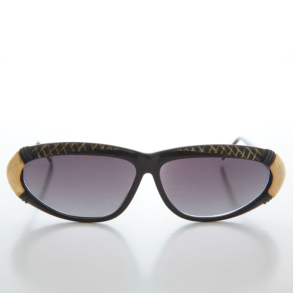 Vintage women's 80s sunglasses by Sunglass Museum, stylish Rachel frame with dark lenses and retro design.