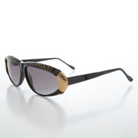 Women's 80s vintage sunglasses by Sunglass Museum, Rachel style, featuring bold frames and retro-inspired design.