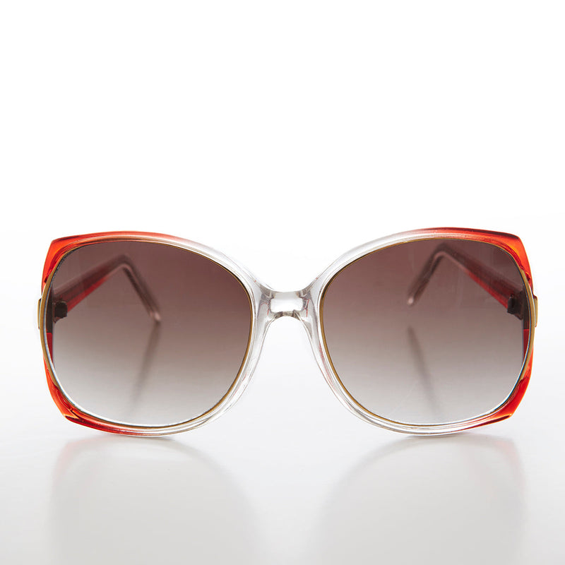 Large square vintage women's sunglasses by Sunglass Museum, Nicole style with dark tinted lenses and thick frame.