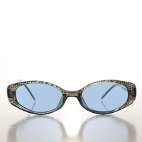 90s oval sunglasses with tinted lenses by Sunglass Museum featuring a stylish vintage design.