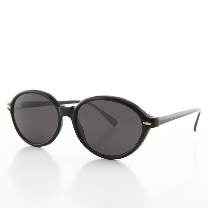 Women's large oval vintage sunglasses by Sunglass Museum featuring retro glamour and stylish oval frames.