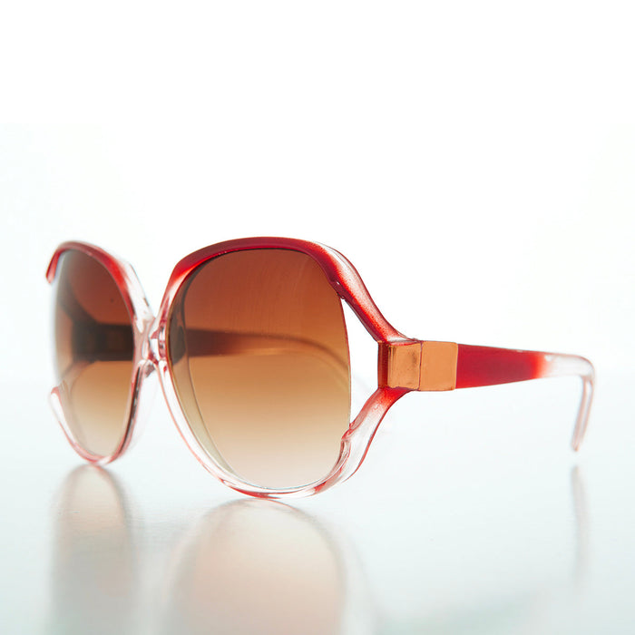 Red oversized 80s women's sunglasses by Sunglass Museum, model Gloria, with bold frames and retro style.