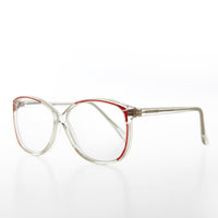 Women's large old-fashioned reading glasses by Sunglass Museum, featuring clear lenses and vintage-style frames.