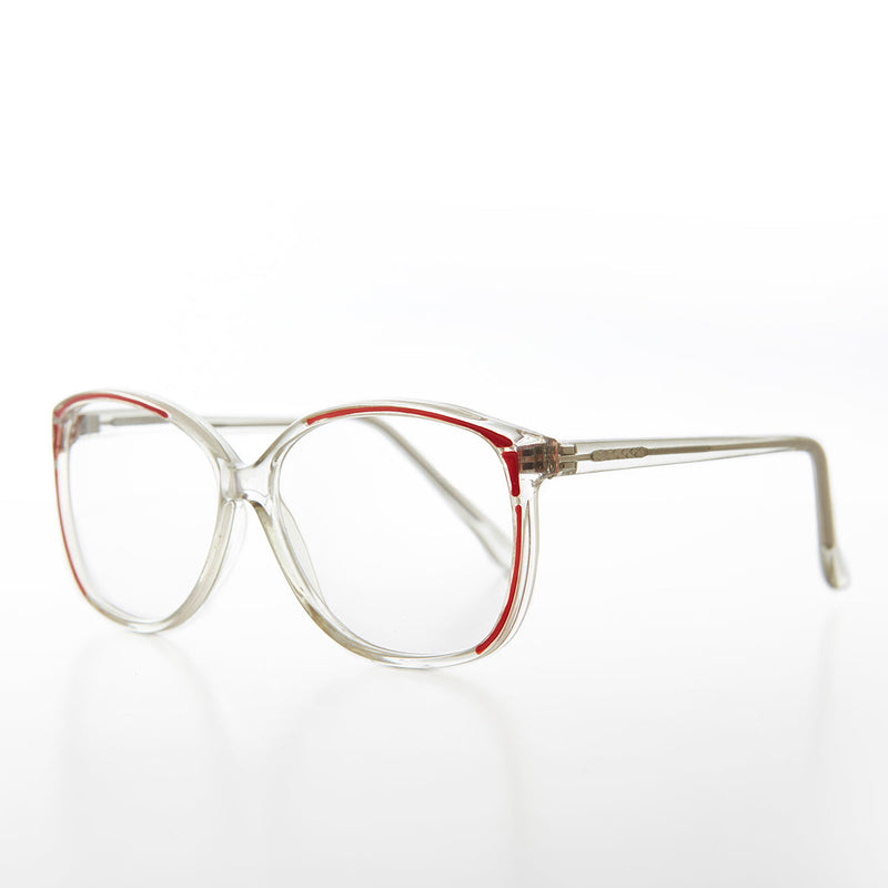 Women's large old-fashioned reading glasses by Sunglass Museum, featuring clear lenses and vintage-style frames.