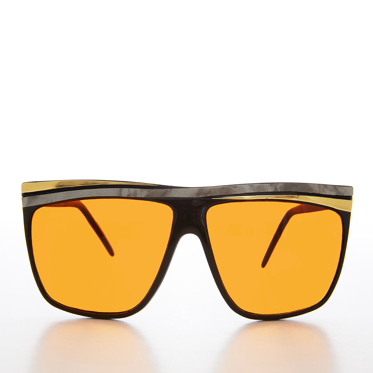 Women's 80s large sunglasses with orange lenses by Sunglass Museum, featuring bold frame and retro style.