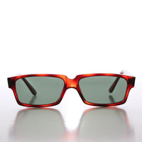Rectangular vintage sunglasses with flat lenses in black, featuring a classic style from Sunglass Museum's Roscoe collection.