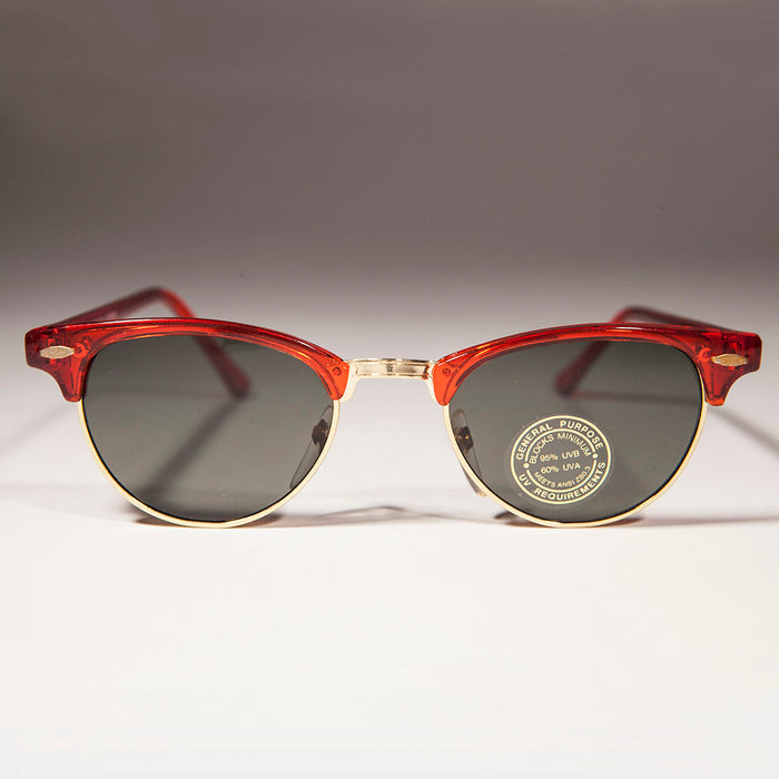 Colorful vintage women's sunglasses with half frame design by Hedy from Sunglass Museum, featuring vibrant, stylish eyewear.