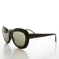 Large tortoise shell cat eye women's sunglasses with green lenses from Sunglass Museum, style Isla.