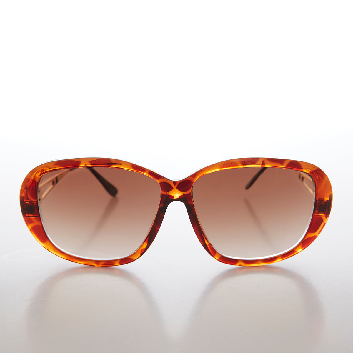 Large women's vintage deadstock sunglasses by Sunglass Museum, glamorous Connie style with bold frames and classic design.