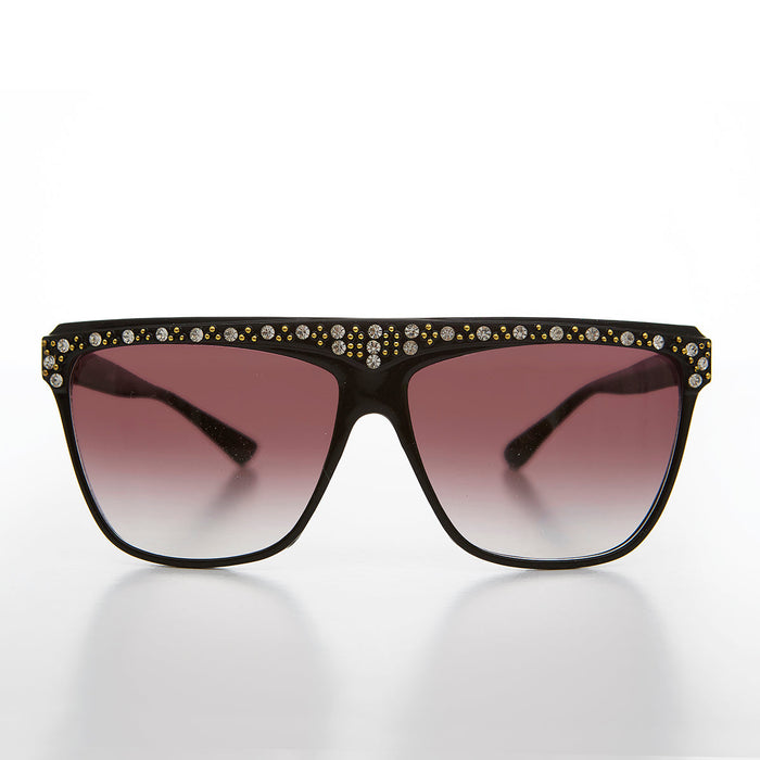 Vintage 80s rhinestone women's sunglasses by Sunglass Museum featuring retro frame and sparkling embellishments.