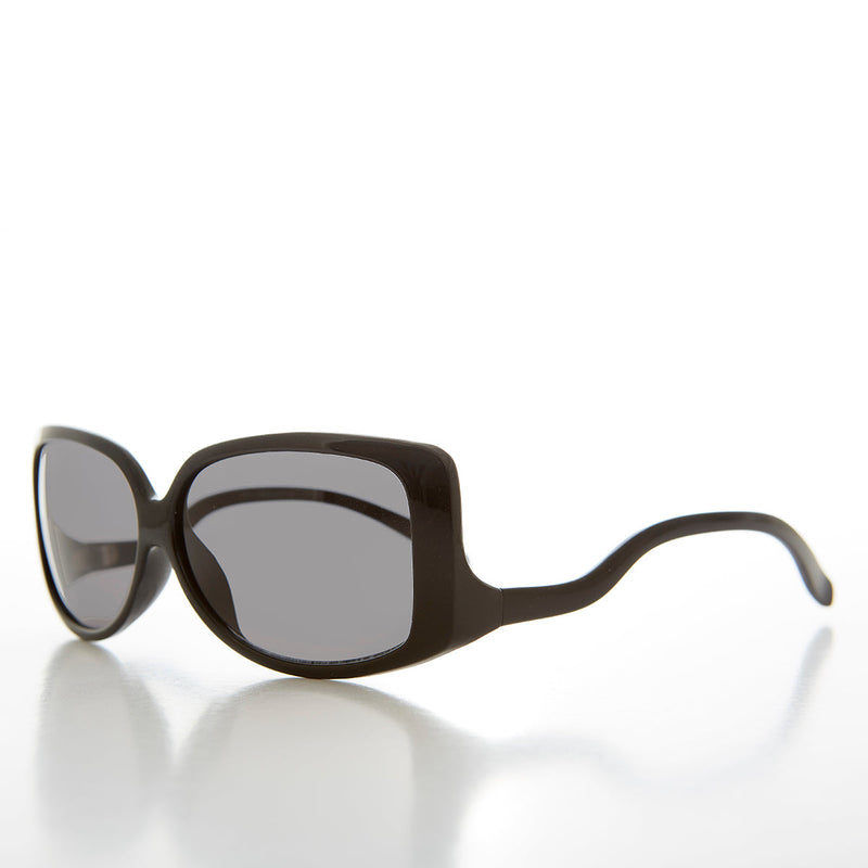 Women's 90s vintage drop temple sunglasses by Sunglass Museum with black frames and gray lenses, stylish retro eyewear.