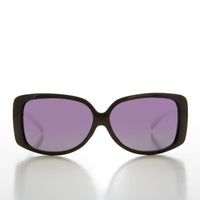 Women's 90s vintage drop temple sunglasses by Sunglass Museum with black frames and gray lenses, stylish retro eyewear.