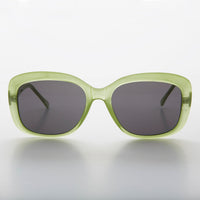 Green square vintage women's sunglasses by Sunglass Museum with retro style and classic design.