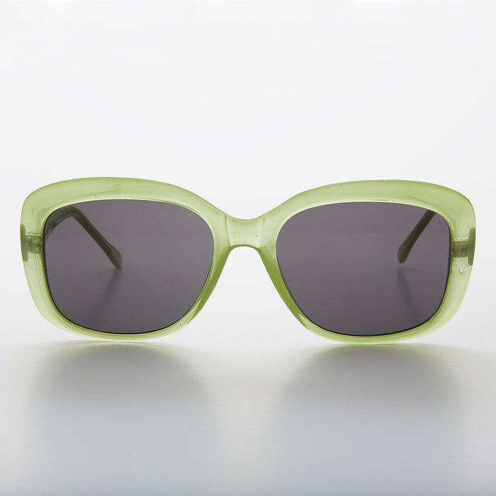 Green square vintage women's sunglasses by Sunglass Museum with retro style and classic design.