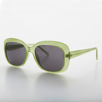 Square retro vintage women's sunglasses by Sunglass Museum in green, featuring a stylish and classic design.