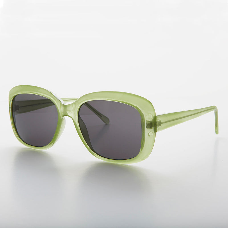 Square retro vintage women's sunglasses by Sunglass Museum in green, featuring a stylish and classic design.