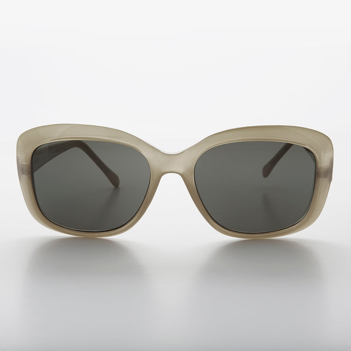 Green square vintage women's sunglasses by Sunglass Museum, retro style with classic frame for a timeless look.