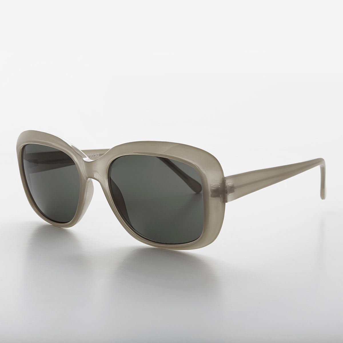 Green square retro vintage women's sunglasses by Sunglass Museum featuring classic frame and stylish design.