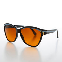 Women's black chunky frame sunglasses, Margot style by Sunglass Museum, deadstock vintage design with dark lenses.