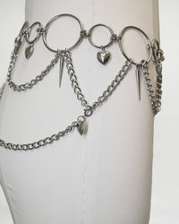 Silver Heartbreaker Waist Chain Belt by SUSPEX Rave Outfits, featuring Y2K-inspired body jewelry design and chain details.