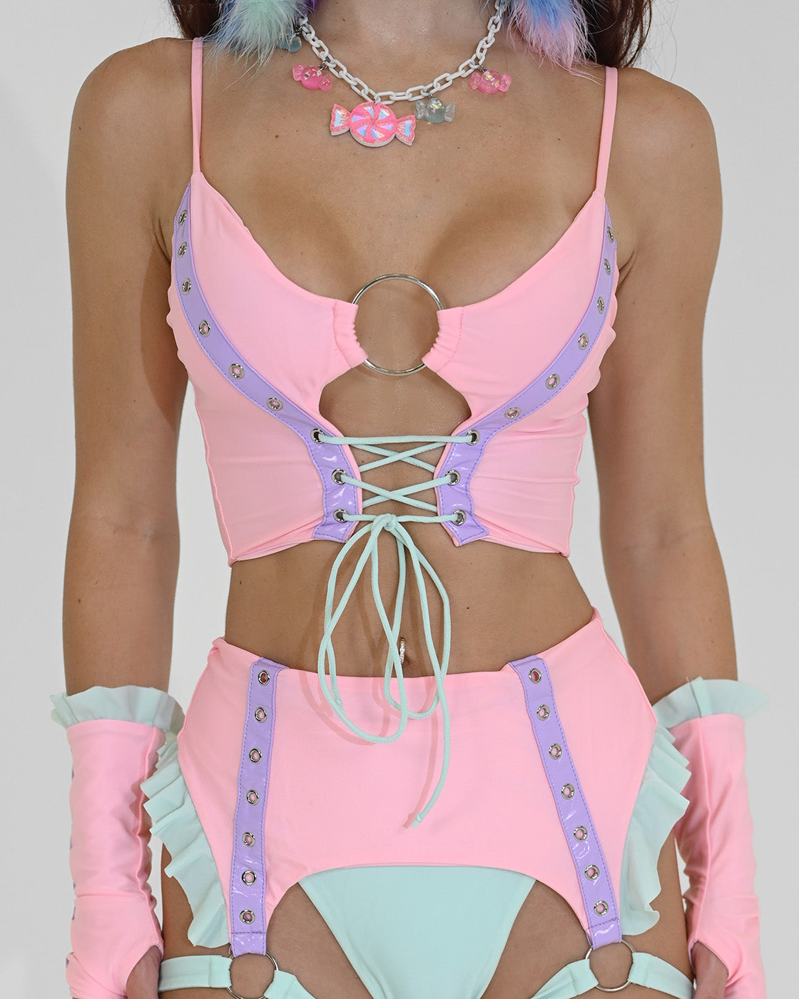 Small Cotton Candy Lace-up Crop Top by SUSPEX Rave Outfits featuring a stylish crop top design with lace-up details.