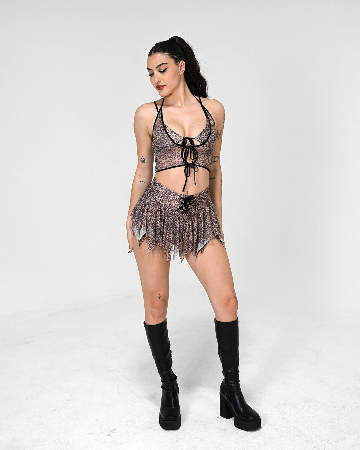 Leopard Luxe Mini Skirt by SUSPEX Rave Outfits featuring a cheetah print mini skirt for festival and rave wear.