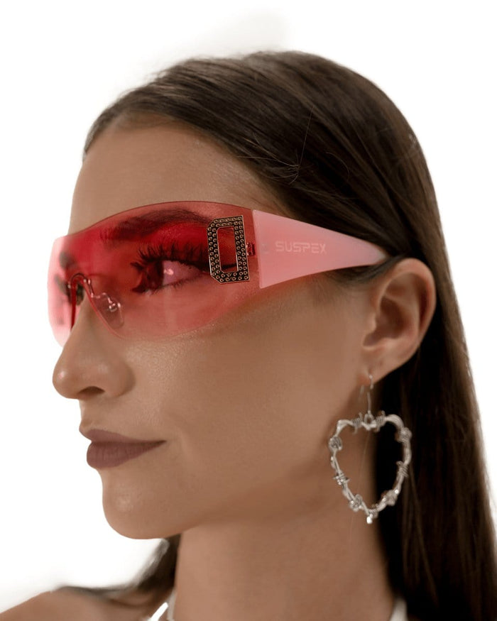 Neon pink shield sunglasses from SUSPEX Rave Outfits with bold, futuristic design and reflective lenses.
