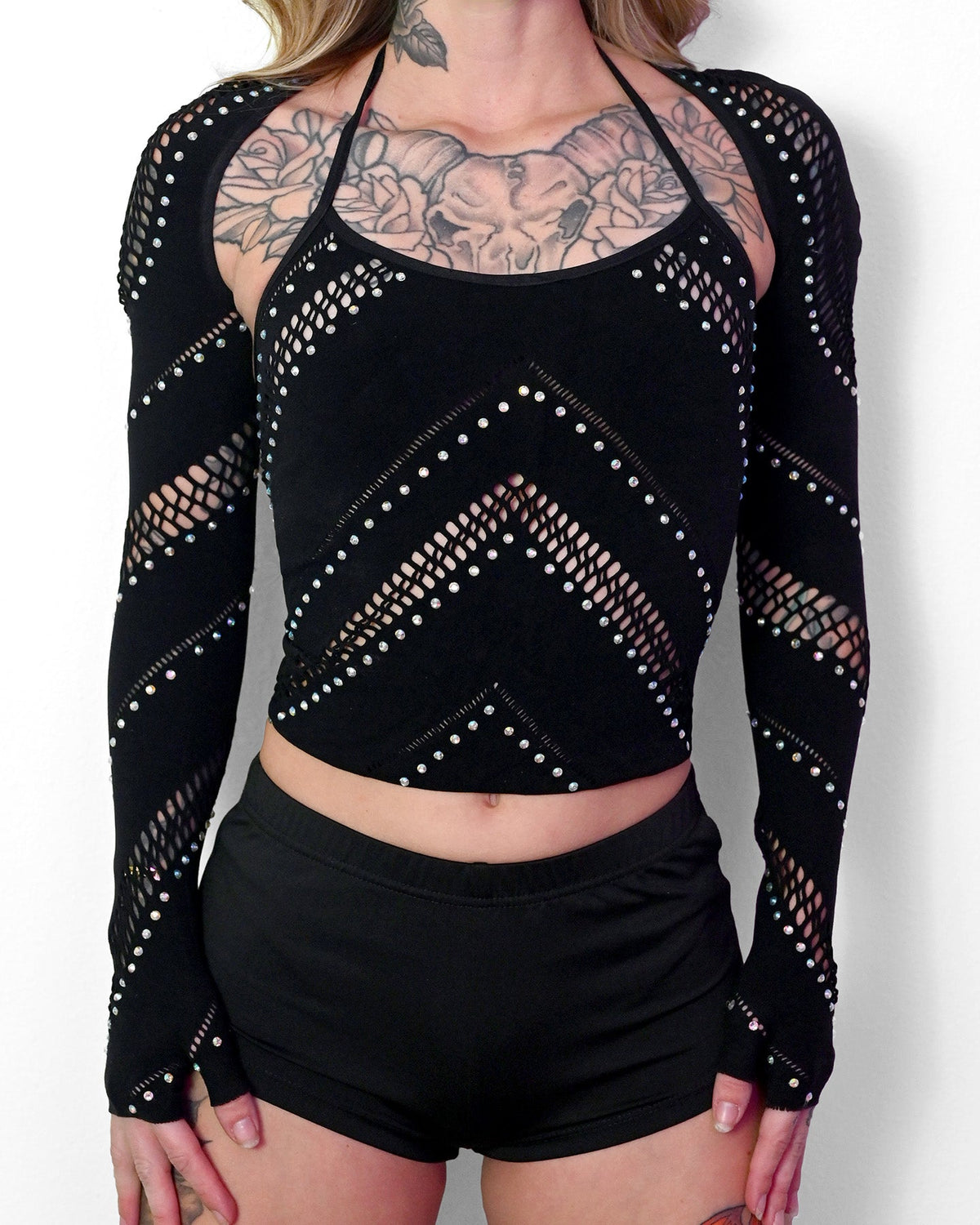 Black sparkle halter crop top from SUSPEX Rave Outfits, stylish rave crop top with a halter neckline and shimmering detail.