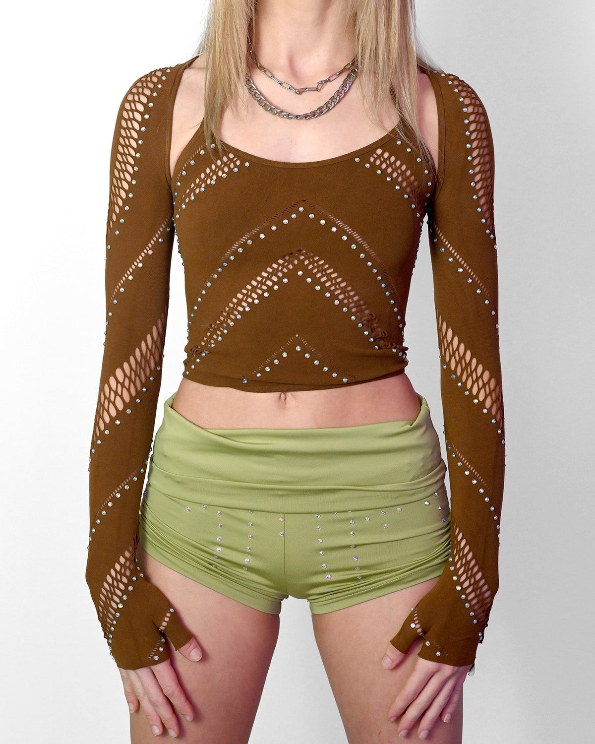 Brown halter crop top with cutout details, part of SUSPEX Rave Outfits' festival bolero set, designed for vibrant dance and rave events.