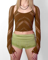 Brown halter crop top with cutout details, part of SUSPEX Rave Outfits' festival bolero set, designed for vibrant dance and rave events.