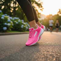 Pink Swift Running APUS women's athletic shoes with breathable mesh and cushioned soles for comfortable running.