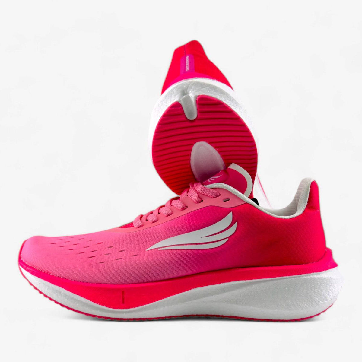 Pink Swift Running APUS Women athletic shoes with breathable mesh and cushioned sole for comfortable running.