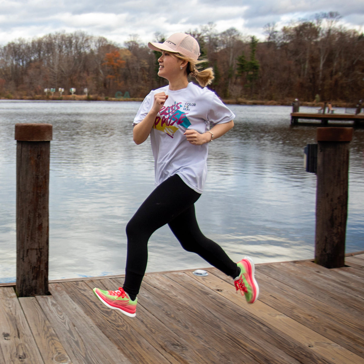 Pink Swift Running athletic shoes for women, sporty design, lightweight and comfortable for active wear.