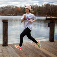 Pink Swift Running athletic shoes for women, sporty design, lightweight and comfortable for active wear.