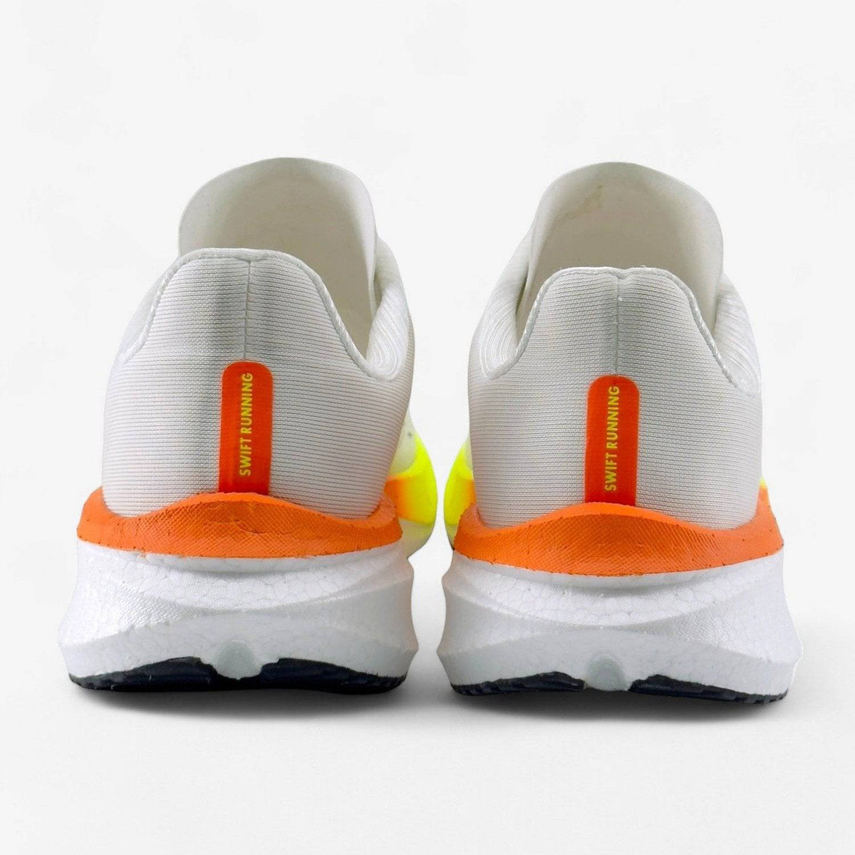 White APUS Women athletic shoes by Swift Running featuring a sleek design and comfortable fit for active wear.