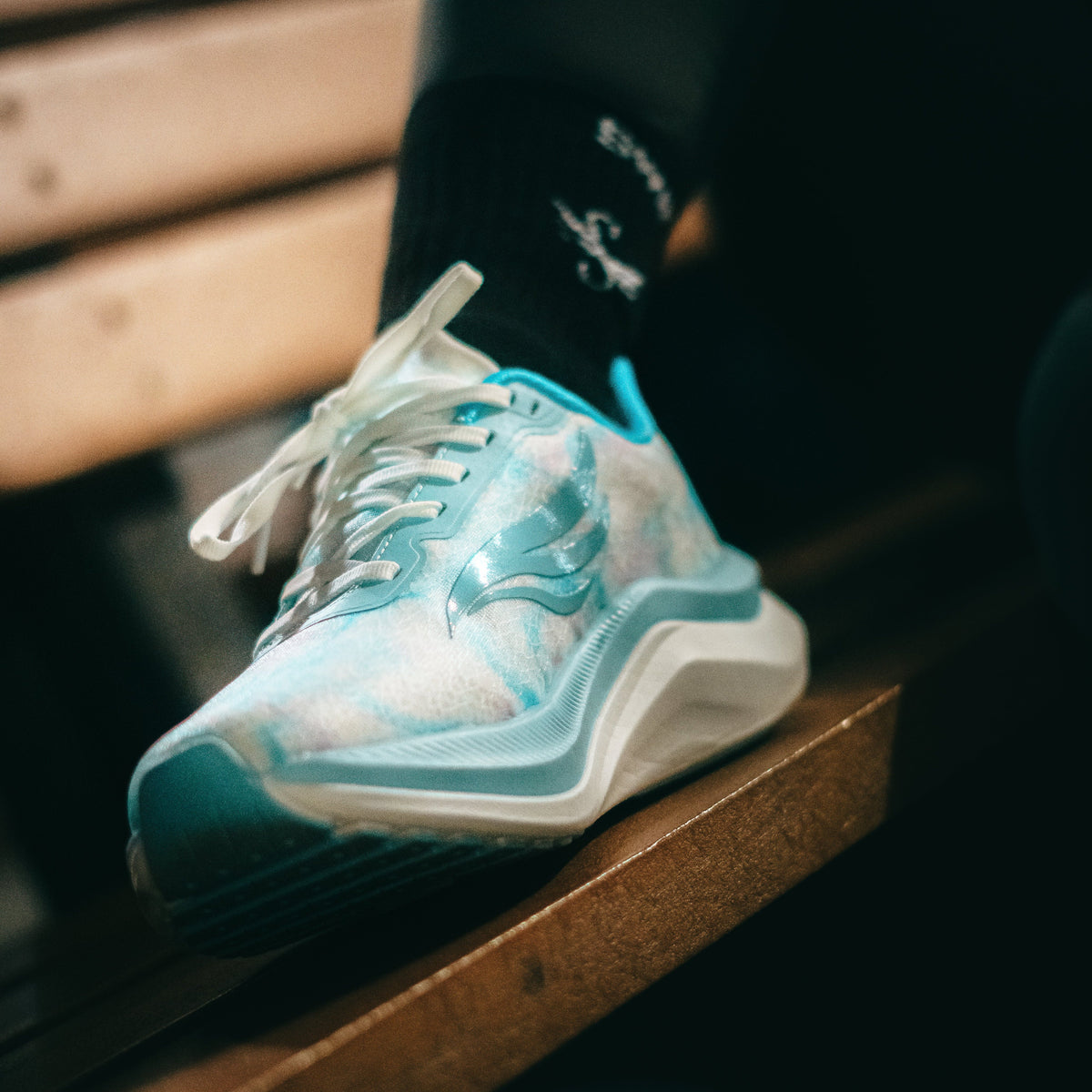 Blue CELER Women athletic shoes by Swift Running, featuring a sleek design and comfortable fit for active wear.