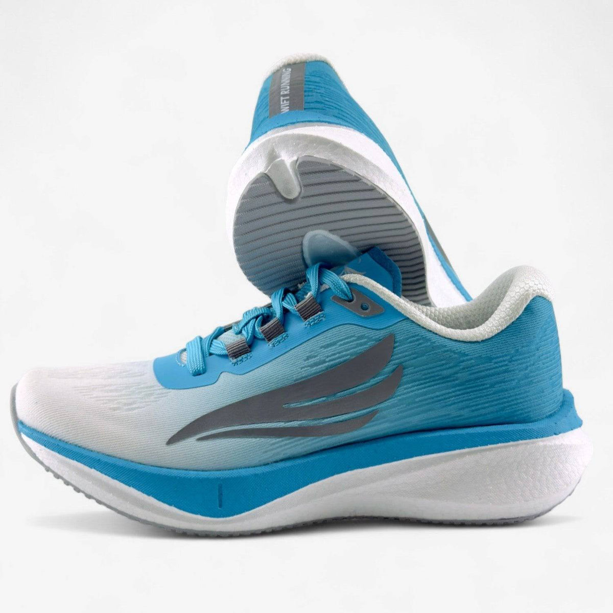 Blue Swift Running HORUS women’s athletic shoes with breathable mesh and cushioned sole for comfortable running and active wear.