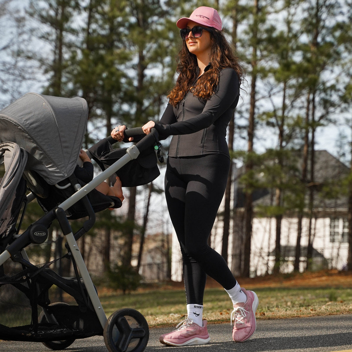 Pink CELER Women athletic shoes by Swift Running, featuring a sleek design and comfortable fit for active wear.