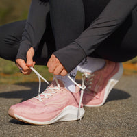 Pink Swift Running CELER Women athletic shoes with breathable mesh and cushioned soles for comfortable running.