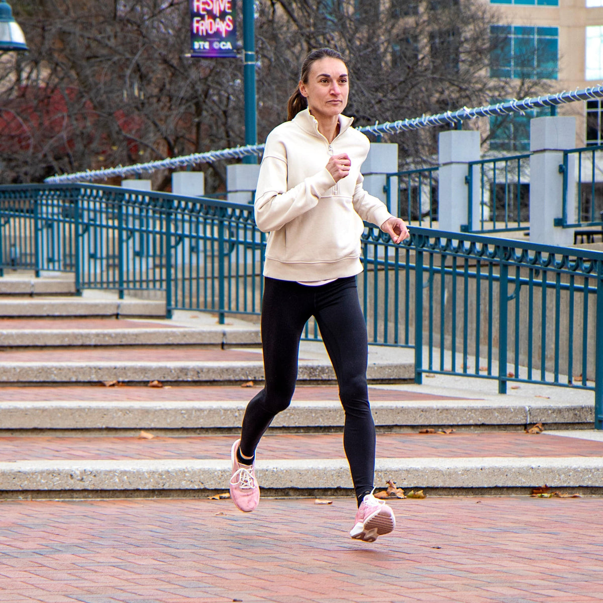Pink CELER Women athletic shoes by Swift Running, featuring a sporty design and breathable fabric for active wear.