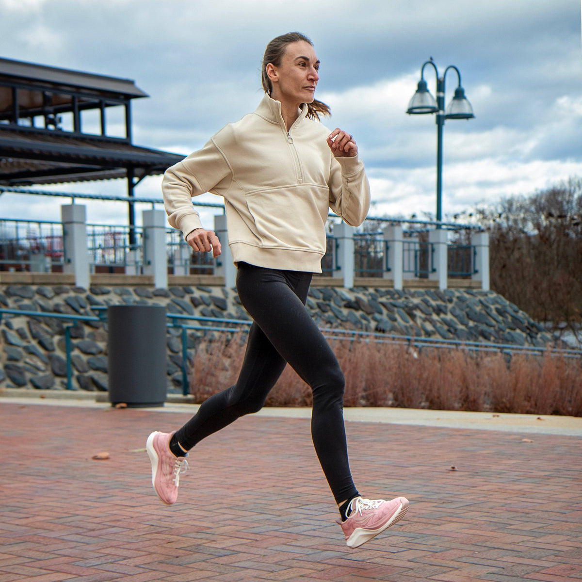 Pink CELER women's athletic shoes by Swift Running with breathable mesh uppers and cushioned soles for comfort and performance.