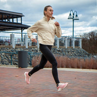 Pink CELER women's athletic shoes by Swift Running with breathable mesh uppers and cushioned soles for comfort and performance.