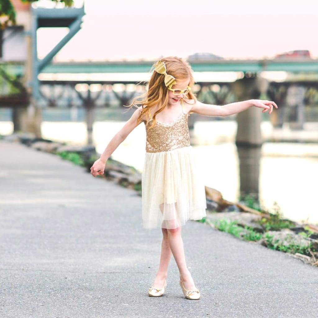Cute Talaria Littles girls' shoes featuring soft pastel colors and comfortable flat design, ideal for everyday wear.