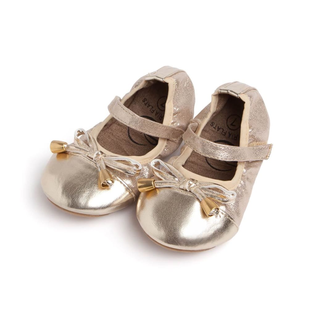 Girls Talaria Flats shoes with straps, featuring a stylish and comfortable design suitable for young children.