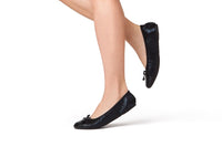 Black Talaria Flats shoes with sleek, smooth design, showcasing the premium black flats in a close-up view.