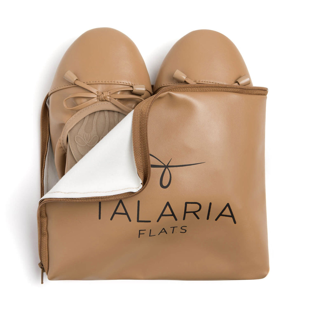Talaria Flats premium caramel-colored shoes partially inside a bag, showcasing stylish and comfortable flats for women.