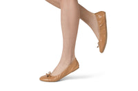 Talaria Flats caramel-colored shoes with folded design, showcasing the stylish and comfortable caramel flats.