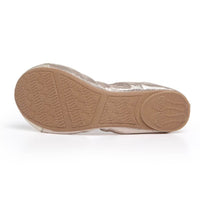 Talaria Flats champagne-colored shoes with a sleek, elegant design and pointed toes, perfect for stylish occasions.