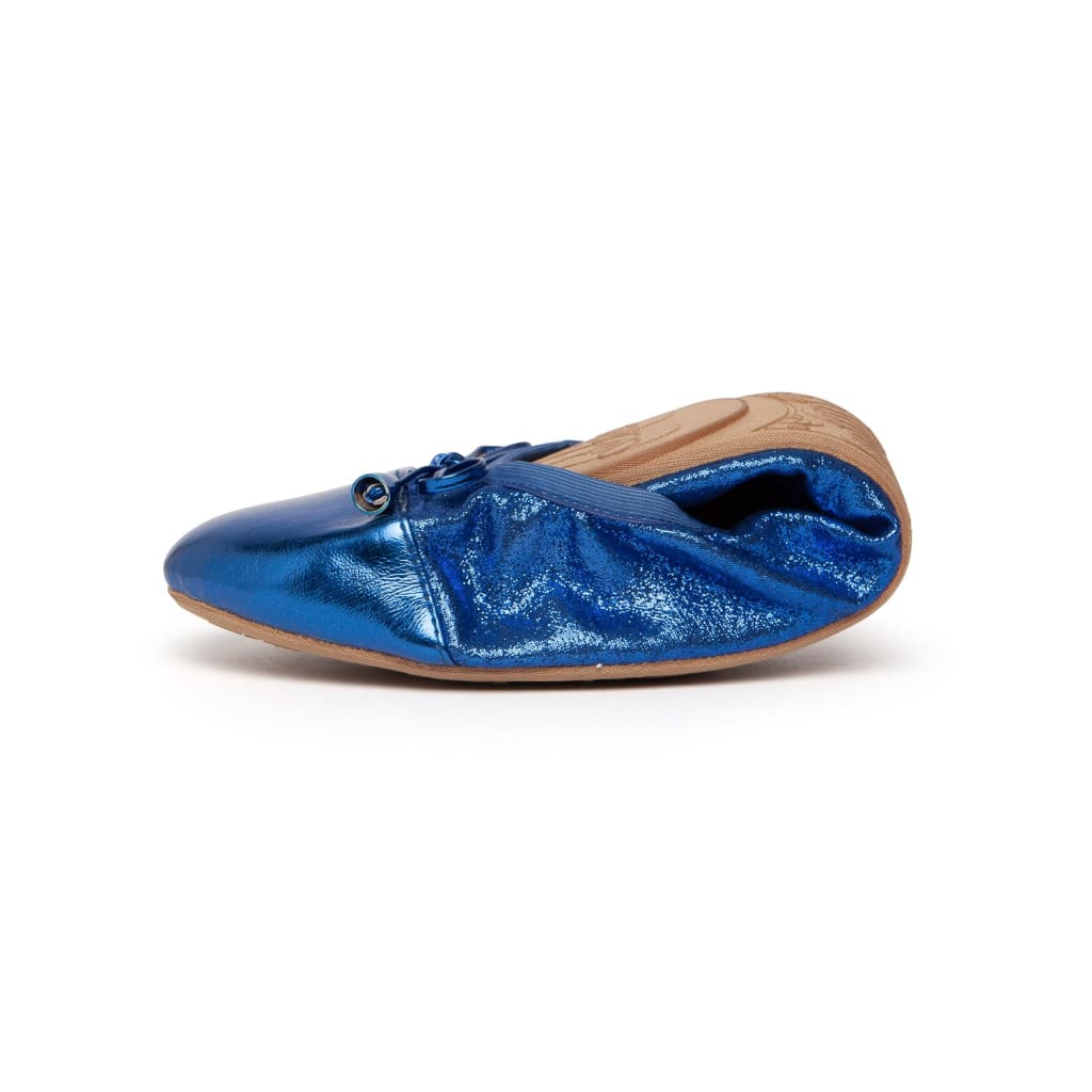 Cobalt blue Talaria Flats shoes with sleek design, featuring smooth leather and comfortable flat sole for casual wear.